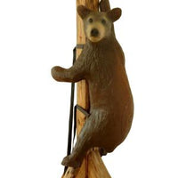 3D field archery target LG Leitold Gamut small climbing brown bear with straps shown mounted on a wooden pole to demonstrate target
